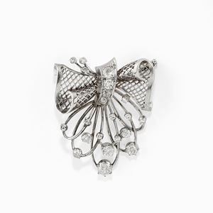A platinum and diamond brooch