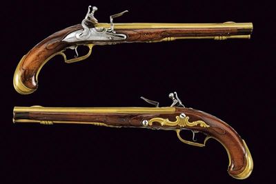 Paio di Eleganti Pistole a Pietra Focaia da Marina