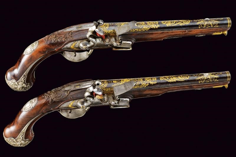 Paio di Straordinarie Pistole a Pietra Focaia di Peyret - Dumarest con Fornimenti in Argento