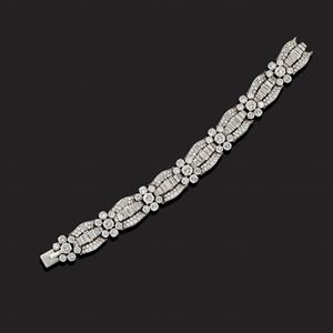 Bracciale in platino e diamanti taglio brillante e baguette ct 23,00