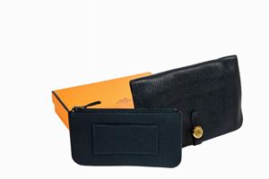 Lotto composto da portafoglio e portamonete