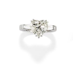 A 18K white gold and diamond ring, with box and warranty