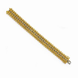 Bracciale in oro giallo 18K e zaffiri taglio rotondo