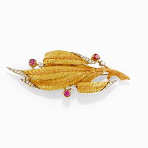 Spilla nei tre ori 18K