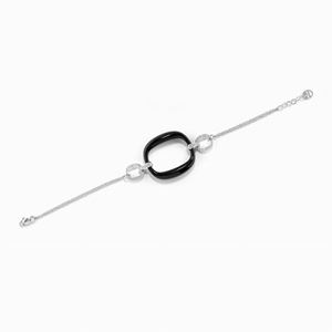 A 18K white gold, diamond and onyx bracelet, Damiani, with box