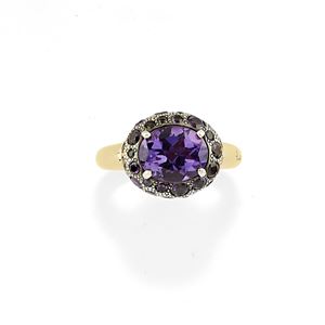 A silver, 18K yellow gold and amethyst ring, Pomellato