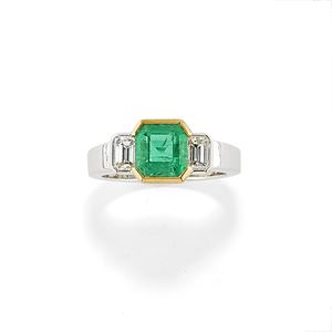 A 18K white gold, emerald and diamond ring