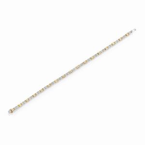 Bracciale tennis in oro bicolore 18K e diamanti taglio brillante e carré ct 4,00