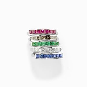 Five 18K white gold, diamond, emerald and ruby rings