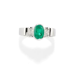 A 18K white gold, emerald and diamond ring
