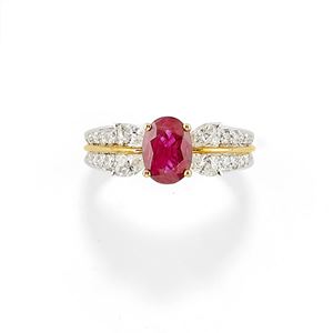 A 18K two-color gold, ruby and diamond ring