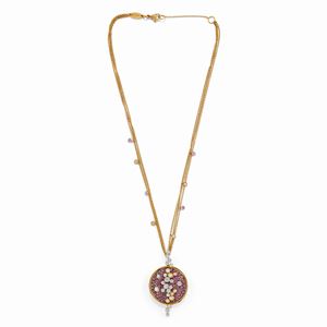A 18K pink gold, pink sapphire and diamond parure, ring, earrings and necklace.