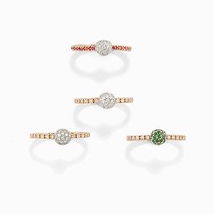 Four 18 two-color gold, diamond, tanzanite and ruby rings