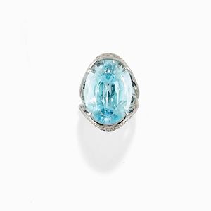 A 18K white gold, rock crystal, topaz, diamond and sapphire ring
