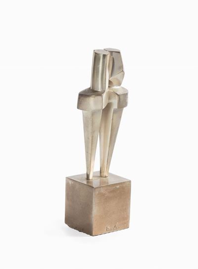 Figura in metallo dorato
