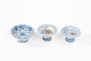 Three white and blue porcelain cake stands