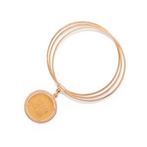 Three-circle bangle with medal