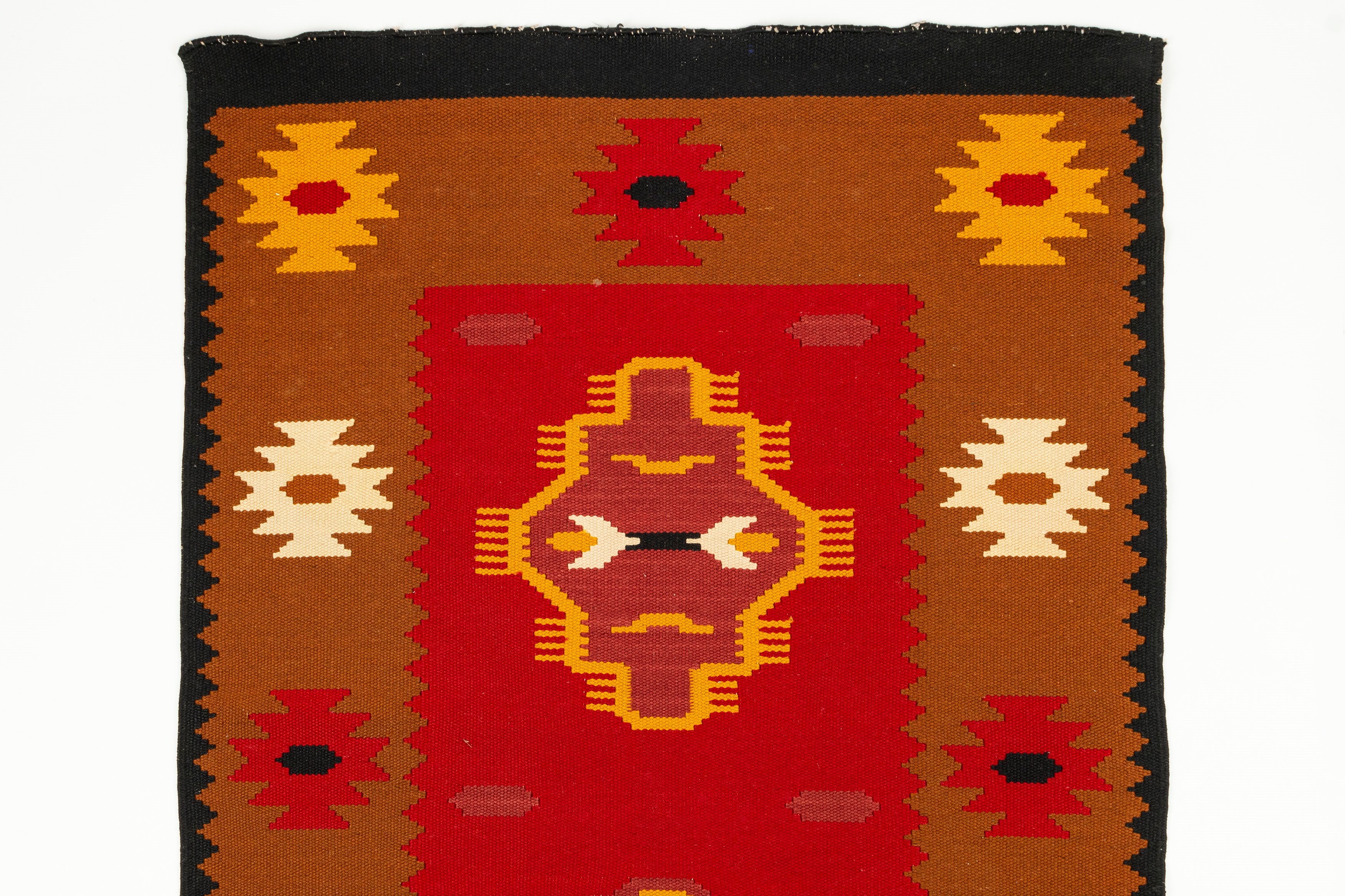 Lotto composto da quattro tappeti, di cui tre Kilim