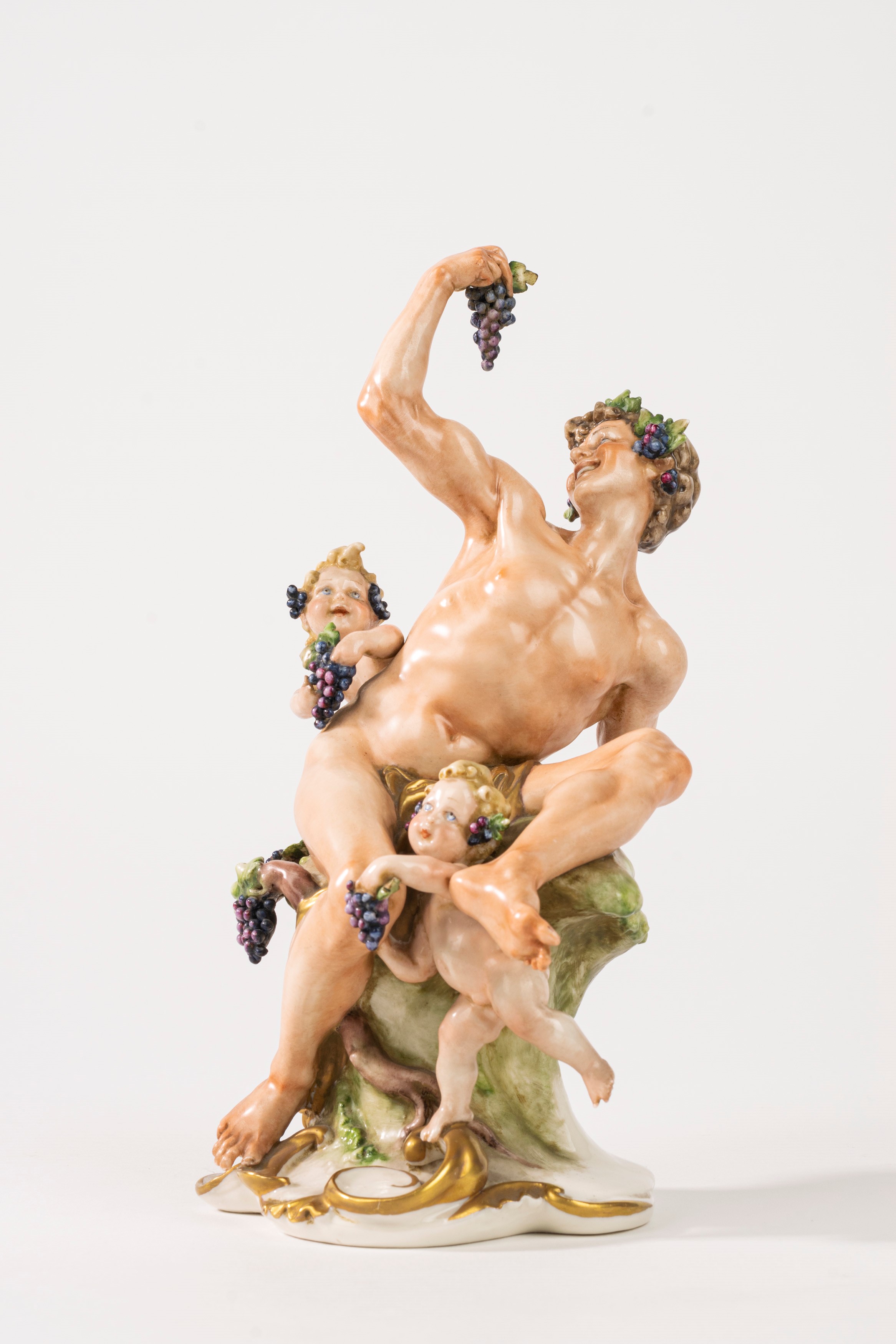 Coppia di Sculture in Porcellana Policroma, Raffiguranti Bacco e Flora, Secolo XX