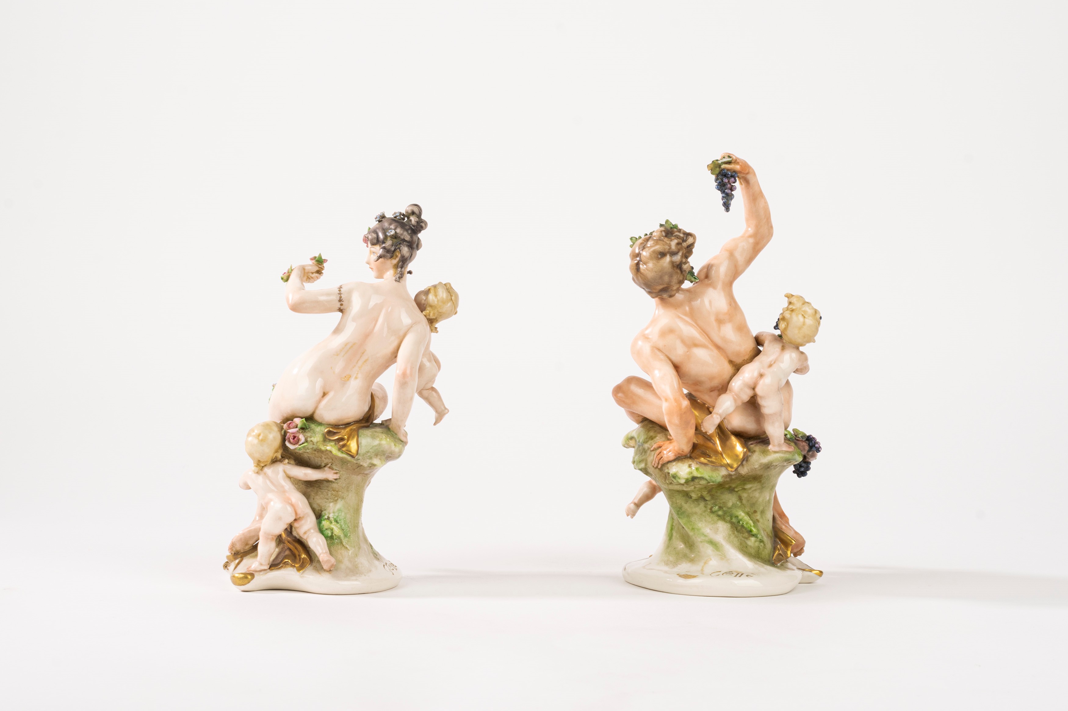 Coppia di Sculture in Porcellana Policroma, Raffiguranti Bacco e Flora, Secolo XX