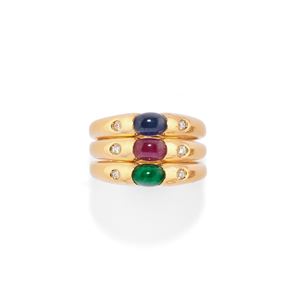 Tre anelli con pietre di colore