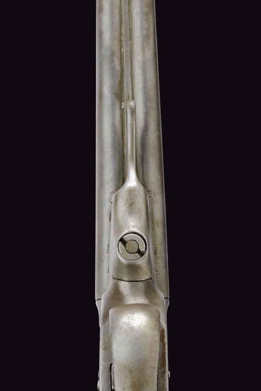 Pistola a percussione centrale a due canne