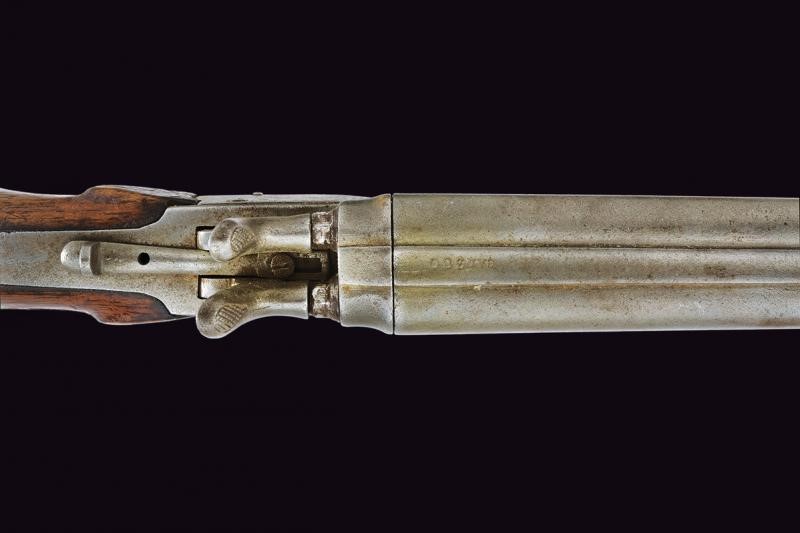 Pistola a percussione centrale a due canne
