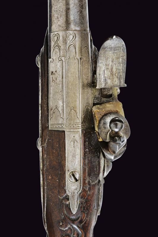 Pistola a pietra focaia a semi-retrocarica