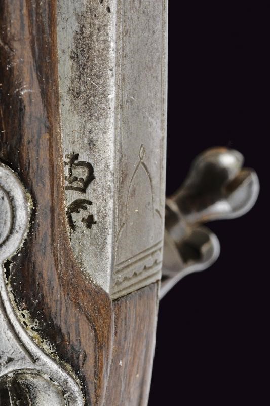 Pistola a pietra focaia a semi-retrocarica