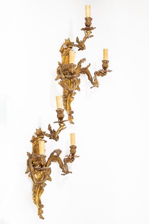 Pair of three-light gilded bronze wall lamps