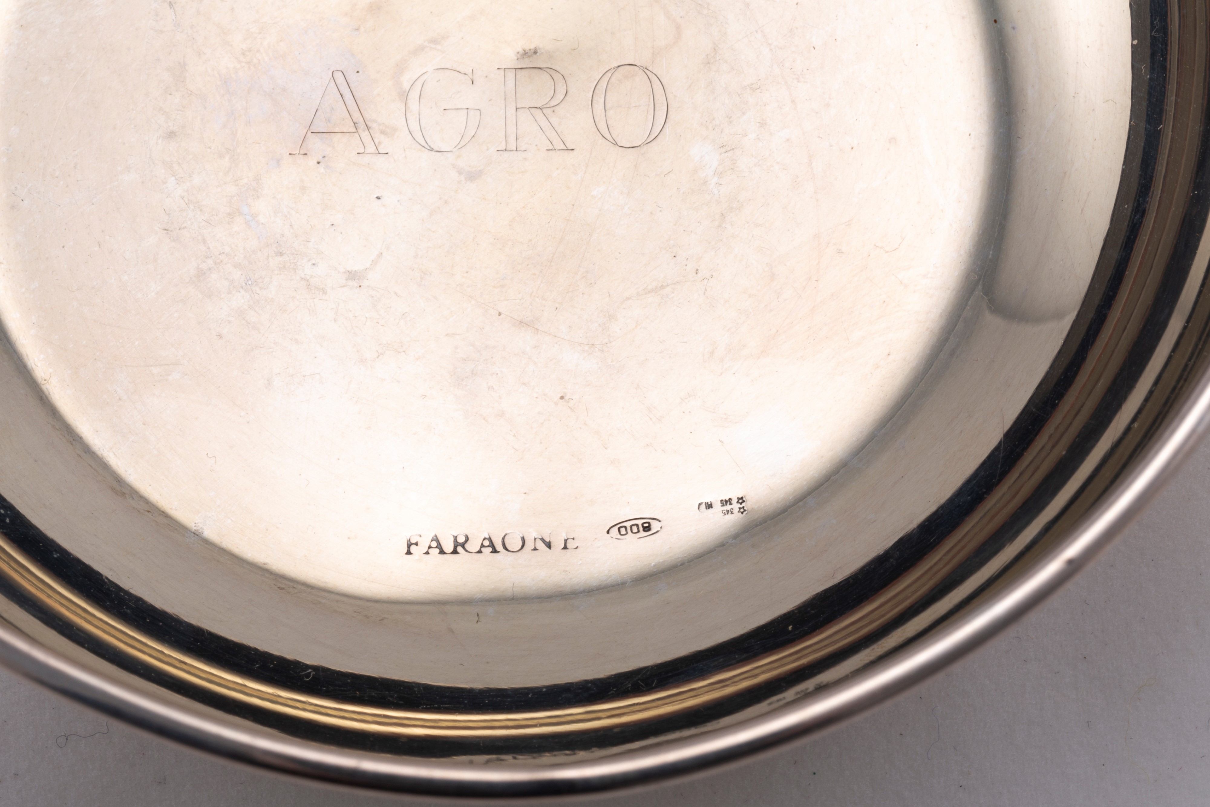 Quattro oggetti firmati