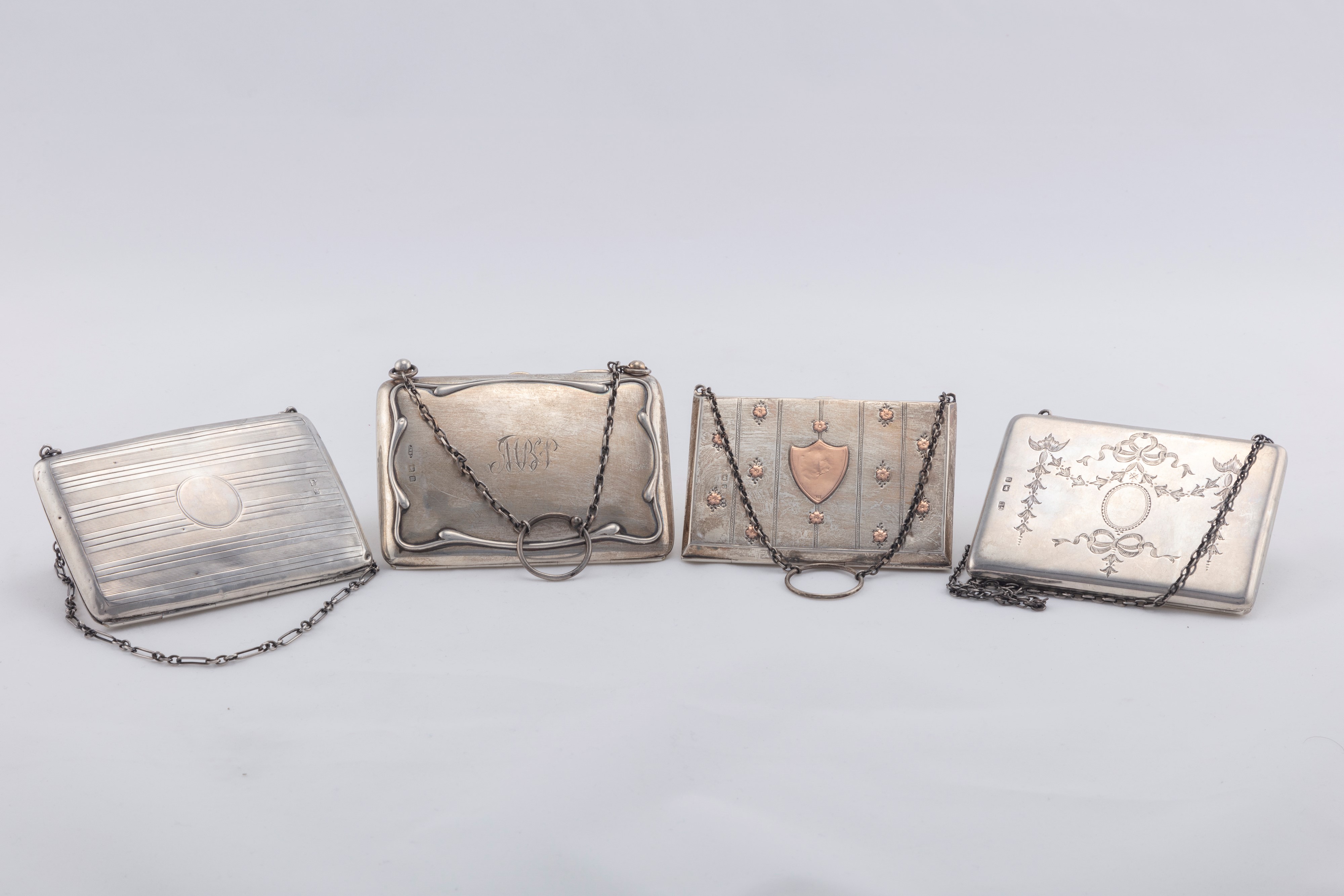 Quattro porta biglietti a foggia di borsetta