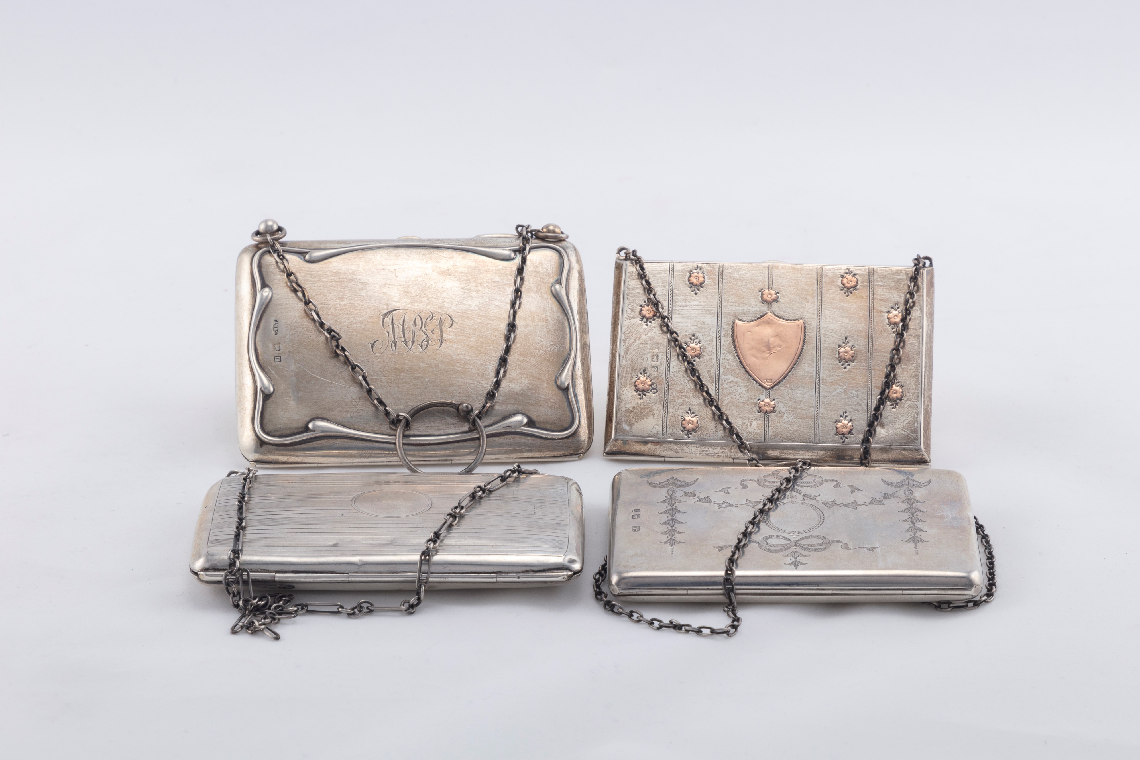 Quattro porta biglietti a foggia di borsetta