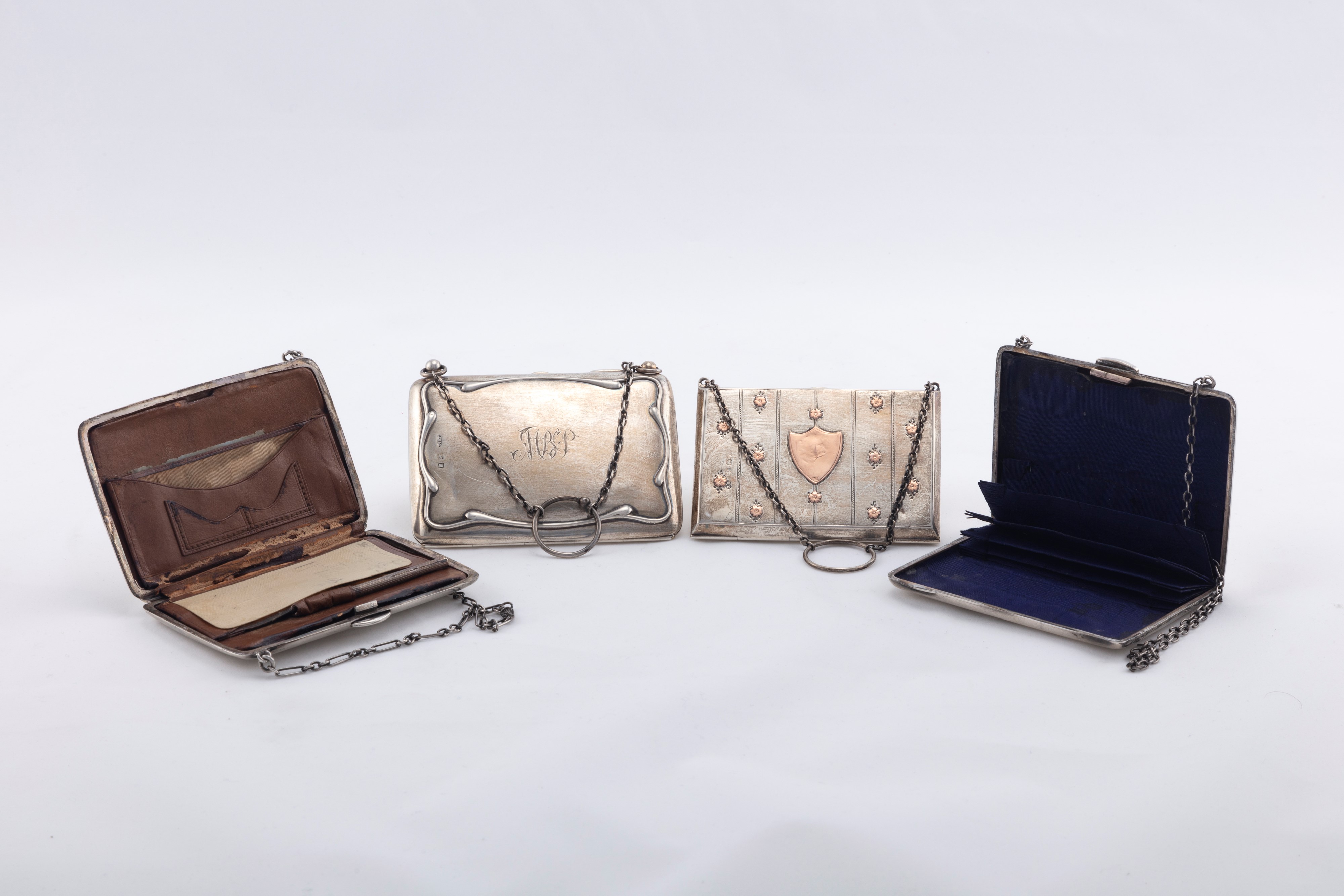 Quattro porta biglietti a foggia di borsetta