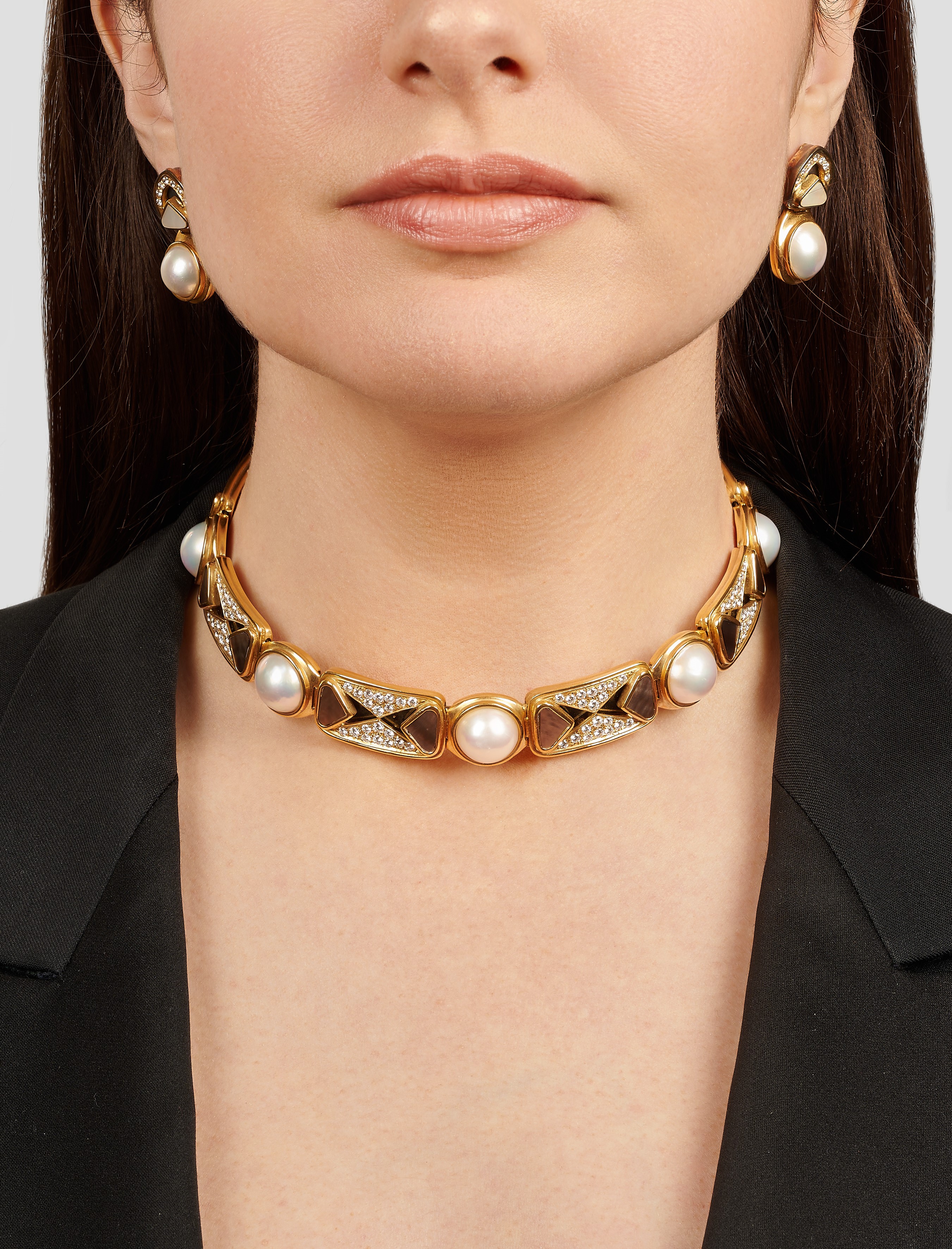 Demi-parure con perle