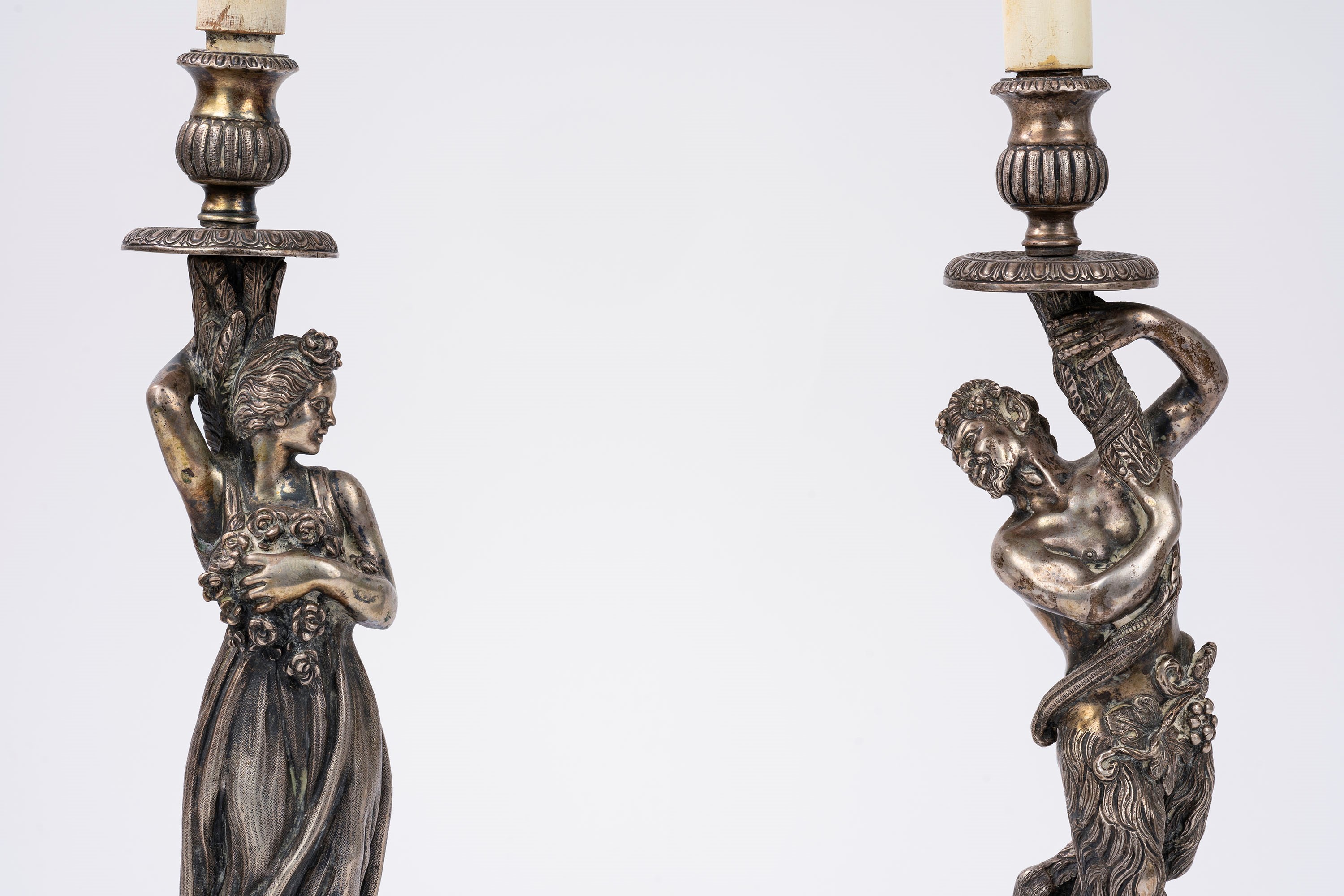 Coppia di candelieri, con satiro e ninfa