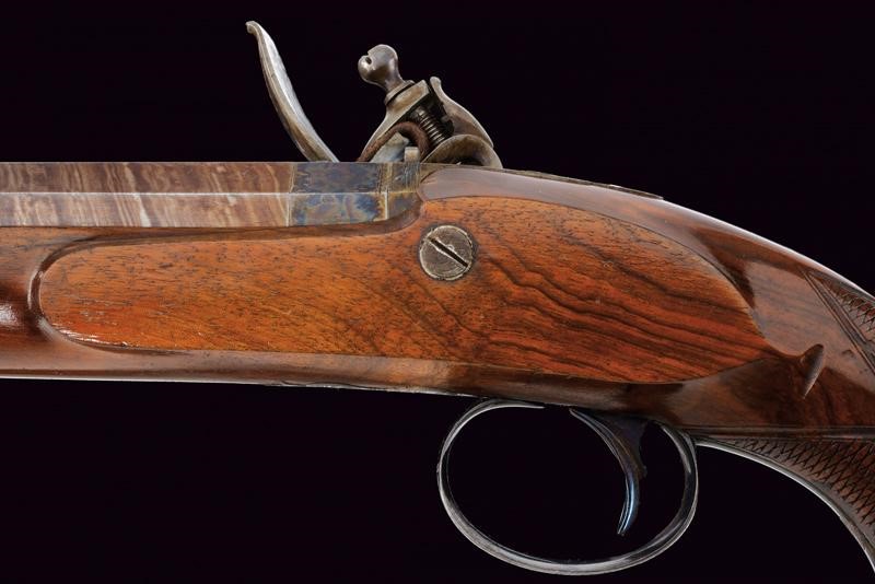 Paio di pistole a pietra focaia di Darwin in cassetta