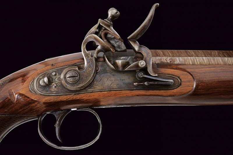 Paio di pistole a pietra focaia di Darwin in cassetta