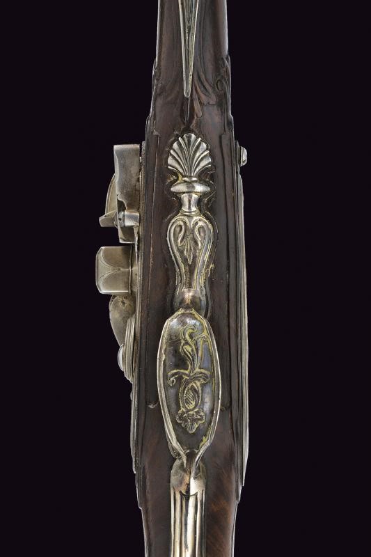 Pistola a pietra focaia con fornimenti in argento di Pietro Tomasi