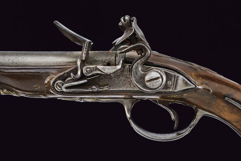 Pistola a pietra focaia a due canne