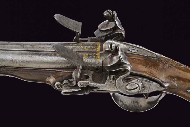 Pistola a pietra focaia a due canne