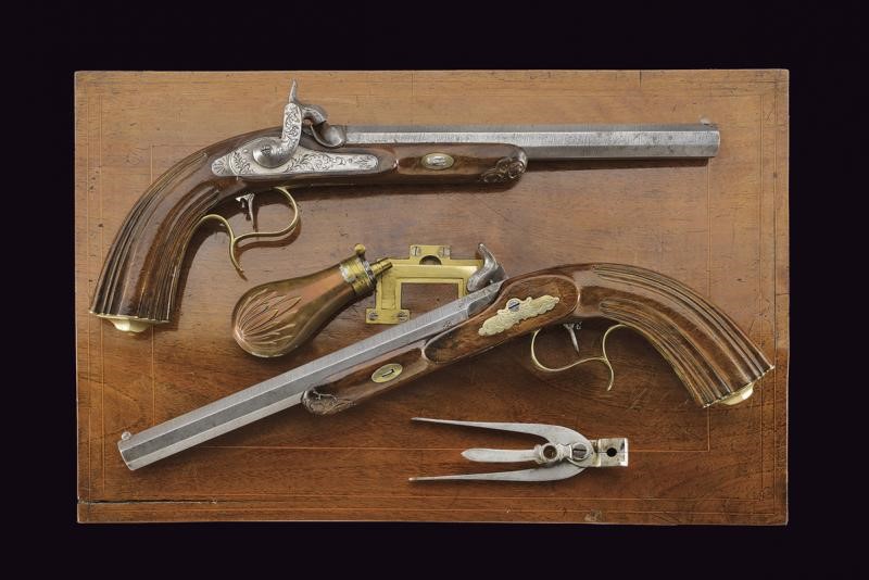 Paio di pistole a luminello da tiro in cassetta