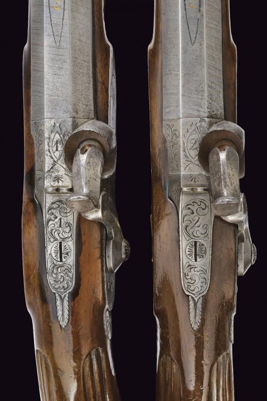 Paio di pistole a luminello da tiro in cassetta