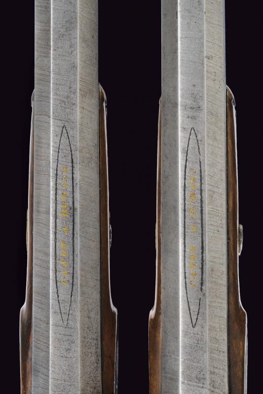 Paio di pistole a luminello da tiro in cassetta