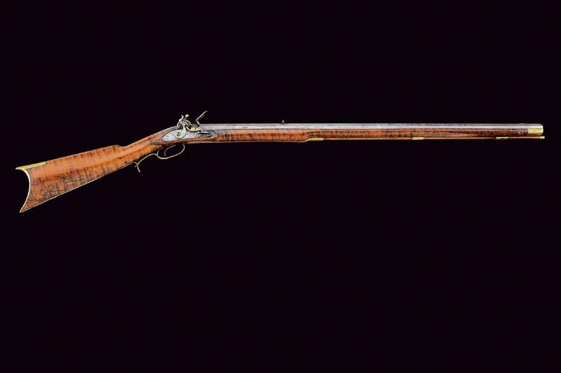 "Long rifle" sul tipo Kentucky a pietra focaia
