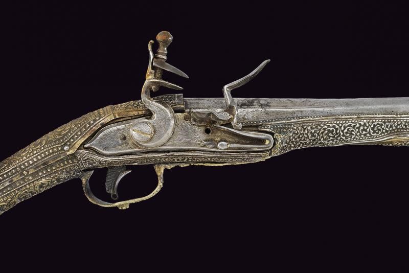 Pistola a Pietra Focaia con Fornimenti in Argento