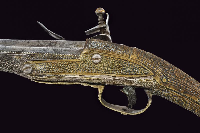 Pistola a Pietra Focaia con Fornimenti in Argento