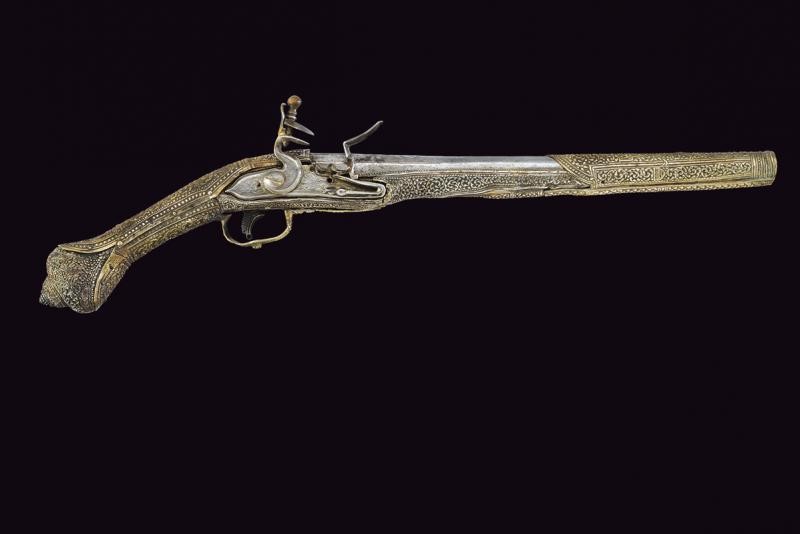 Pistola a Pietra Focaia con Fornimenti in Argento