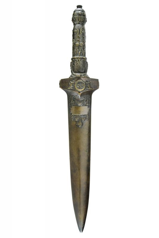 Scultura Commemorativa Parietale Effigiante una Daga