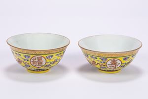 Two small polychrome porcelain bowls with a yellow background, China, 20th century